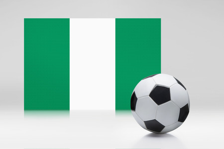 Nigeria flag with a soccer ballの写真素材