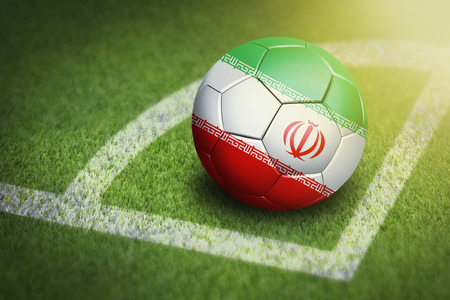 Taking a corner with Iran flag soccer ballの写真素材