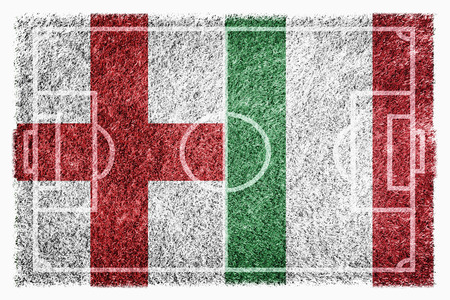 Flags of England and Italy on soccer fieldの写真素材