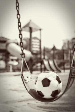 Soccer ball on a playgroundの写真素材