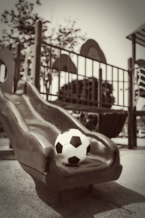 Soccer ball on a playgroundの写真素材