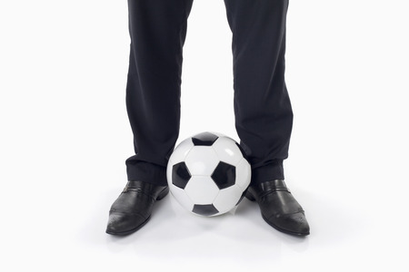 Soccer manager with a ballの写真素材