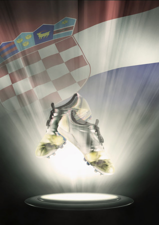 Football cleats with Croatia flag backdropの写真素材