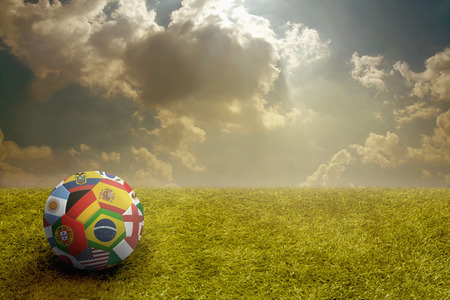 World flags soccer ball on a playing fieldの写真素材