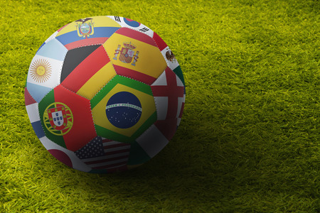 World flags soccer ball on a playing fieldの写真素材