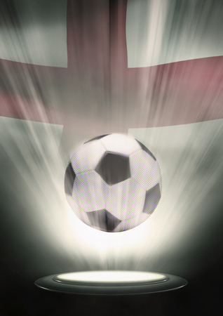 A soccer ball with England flag backdropの写真素材