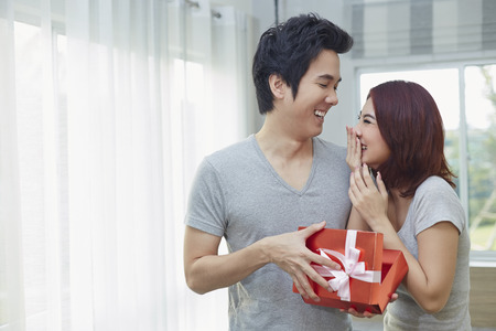 Boyfriend give his girlfriend a presentの写真素材
