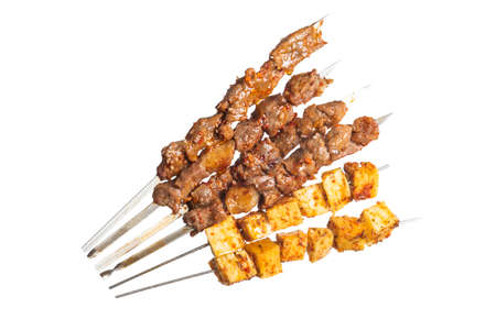 Grilled skewers on iron sticksの写真素材
