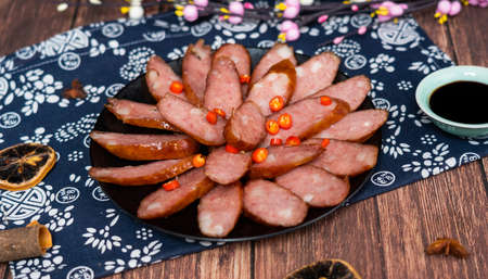 Sliced sausage on the plateの写真素材