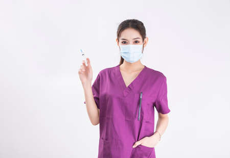 female nurse in purple nurse uniform