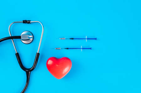 red heart and stethoscope photography