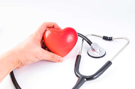 red heart and stethoscope photographyの写真素材