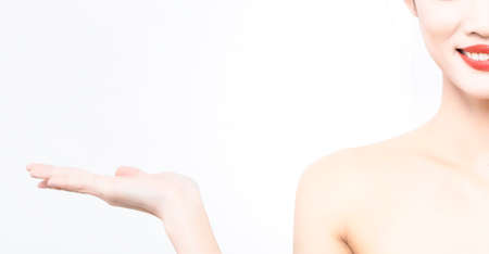 woman doing lift with one handの写真素材