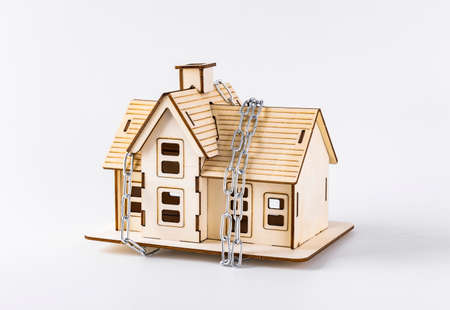 house model tied with chainsの写真素材