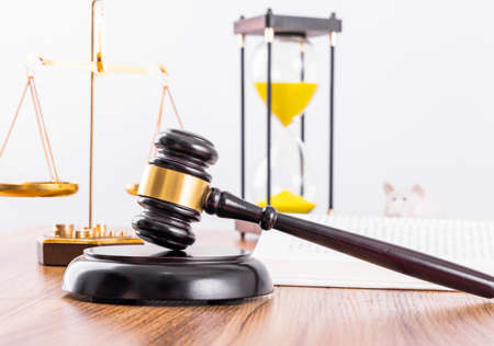 Judge hammer and scales on the table, legal issuesの写真素材