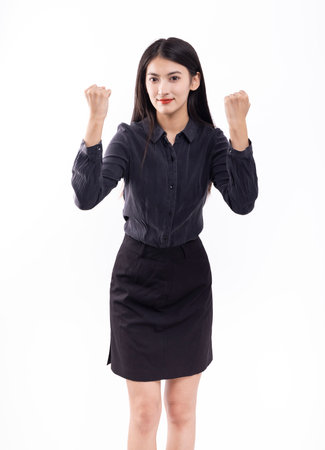 Young Asian businesswoman posing in the studio - isolated on white backgroundの写真素材