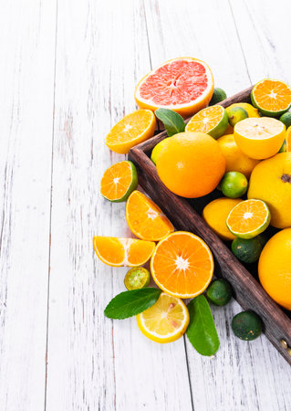 Variety of citrus fruits including lemons, lines, grapefruits and oranges.の写真素材