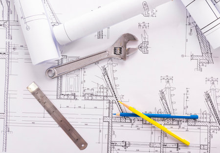 Architectural plans and tools on the background of the architectural projectの写真素材