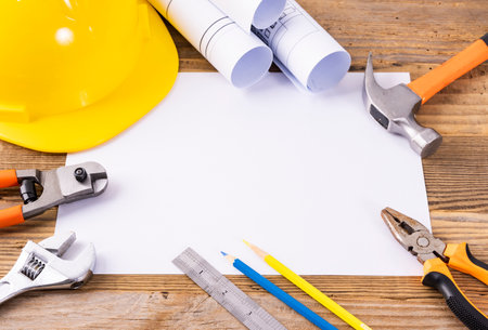 Set of construction tools on wooden background. Top view with copy spaceの写真素材