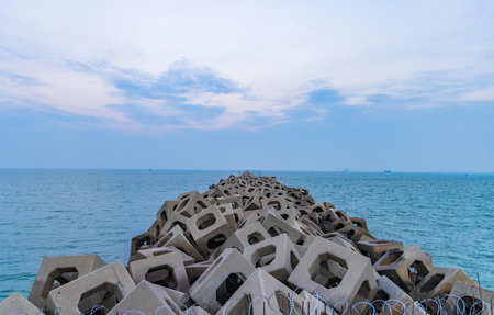 Concrete blocks on the sea shore in the evening, Thailand.の写真素材