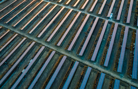 Aerial view of solar panels on a farm in the countryside.の写真素材