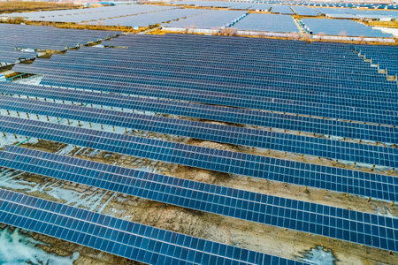 Solar power plant with many rows of solar photovoltaic panelsの写真素材