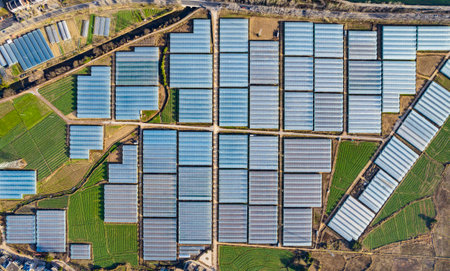 Aerial view of solar power plant with greenhouses in Poland.の写真素材
