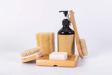 Bath and body care items on a white background. Massage brush, soap, loofahの写真素材