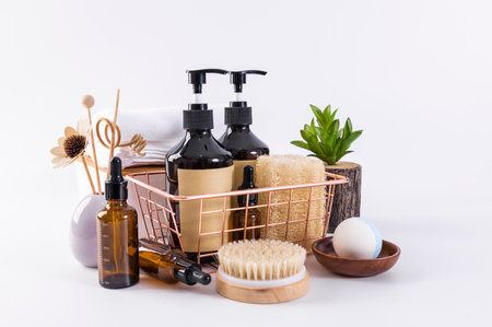 Bath accessories on a white background. Towels, soap, bath salt, massage brush.の写真素材