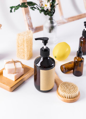 Bath accessories on a white background. Soap, soap, massage brush, shampoo.の写真素材