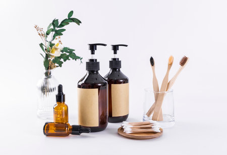 Eco-friendly bamboo toothbrushes, soap and liquid soapの写真素材