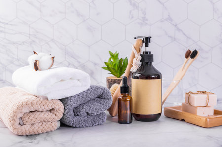 Bathroom interior with cosmetic products and towelsle background.の写真素材