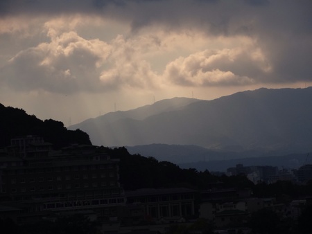 Cloudy sky with sunrays の素材