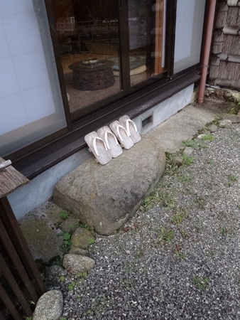 Clogs by glass door of a Japanese Guesthouseの素材