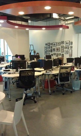Spacious office with working people