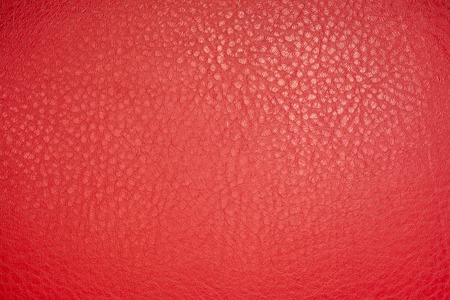 Red leather material texture background close upの写真素材