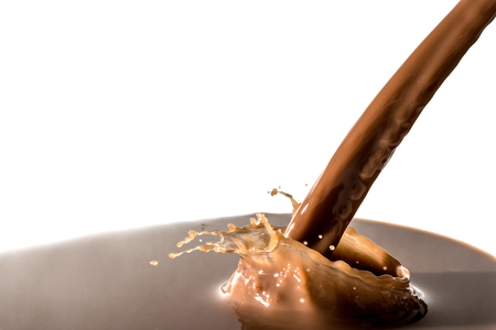 Splash of chocolate, pouring stream of chocolate, cocoa, isolated on white backgroundの写真素材