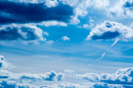 Blue sky with clouds backgroundの写真素材