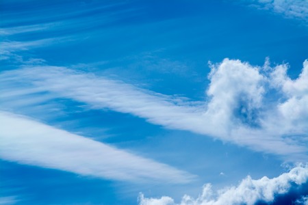 Blue sky with clouds backgroundの写真素材