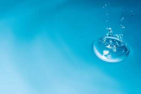 Drop of water background, ripple water textureの写真素材