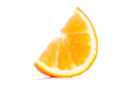 Orange slice closeup background texture isolated on white backgroundの写真素材