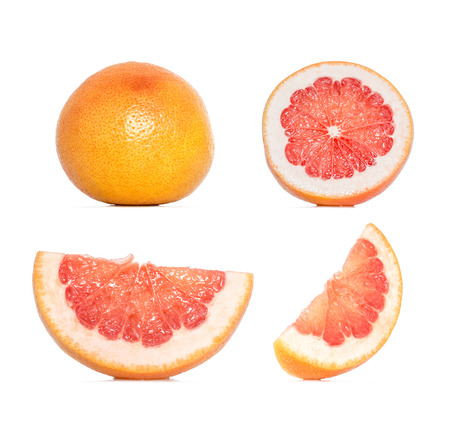 Composition collection of grapefruit in different variations isolated on white background. Whole and sliced grapefruit.の写真素材