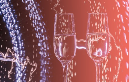 Two glasses of champagne wine on a background of abstract colored lights in motion in the natural...
