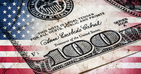 Flag of America with old grunge texture and a one hundred dollar bill closeup