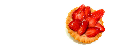 Fruit cake with strawberries close up isolated on white background with place for text.の写真素材