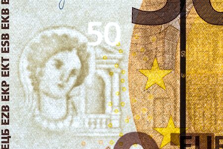 Watermark on a banknote of 50 euros macro close-up. Translucent 50 Euro banknote with visible...