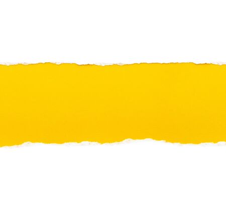 White paper with torn edges isolated with a bright yellow color paper background inside. Good paper textureの写真素材
