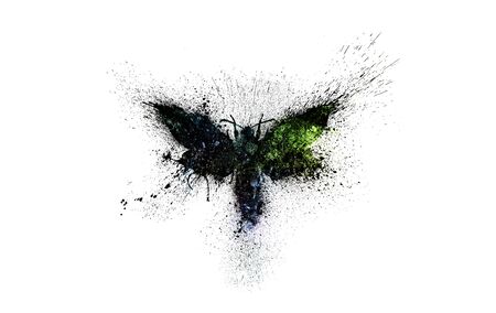 Beautiful butterfly silhouette with multicolored space background inside, nebula, stars and galaxies with paint splashes, splatters and blots isolated on a white background.の写真素材