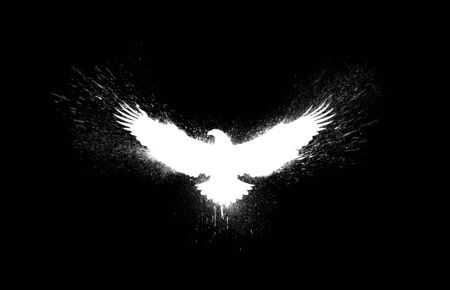 White silhouette of a flying eagle with spread wings with paint splashes, splatters and blots isolated on a black background.の写真素材
