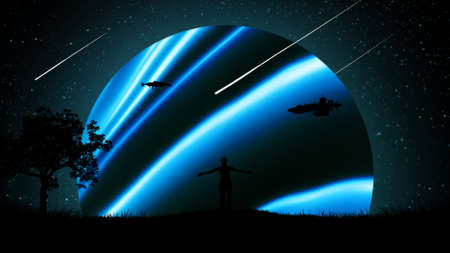 A man at night outdoors with his hands apart, raised to the air against the background of the starry...